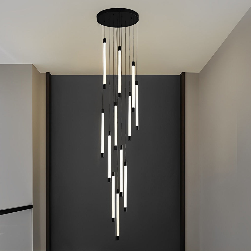 Contemporary staircase chandelier with sleek vertical lights, illuminating a modern two-story staircase.