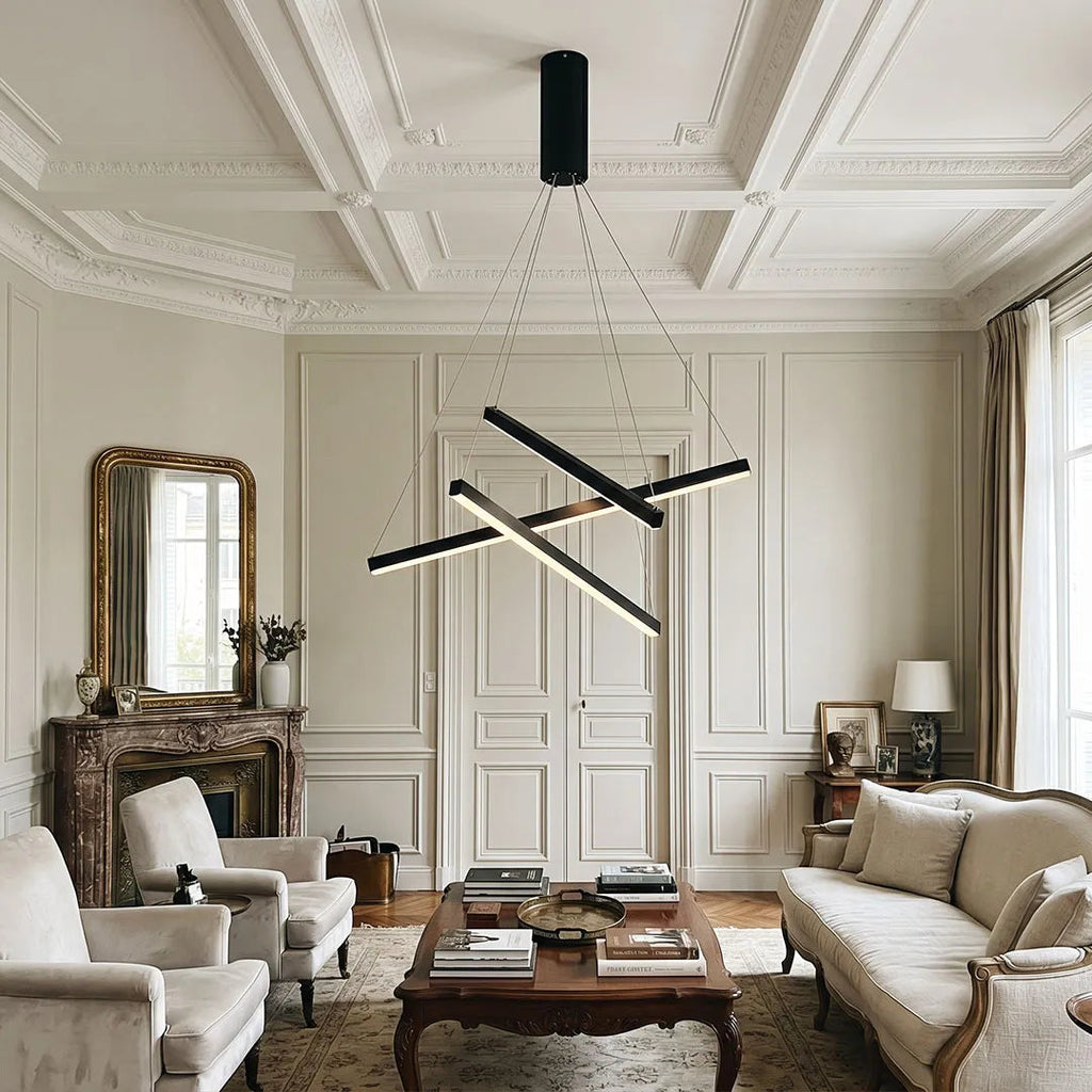 Criss linear chandelier featuring intersecting black metal bars and a modern geometric design in an elegant living room.