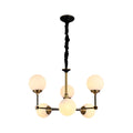 Glass ball chandelier modern with multiple frosted globe lights displayed on a white background.