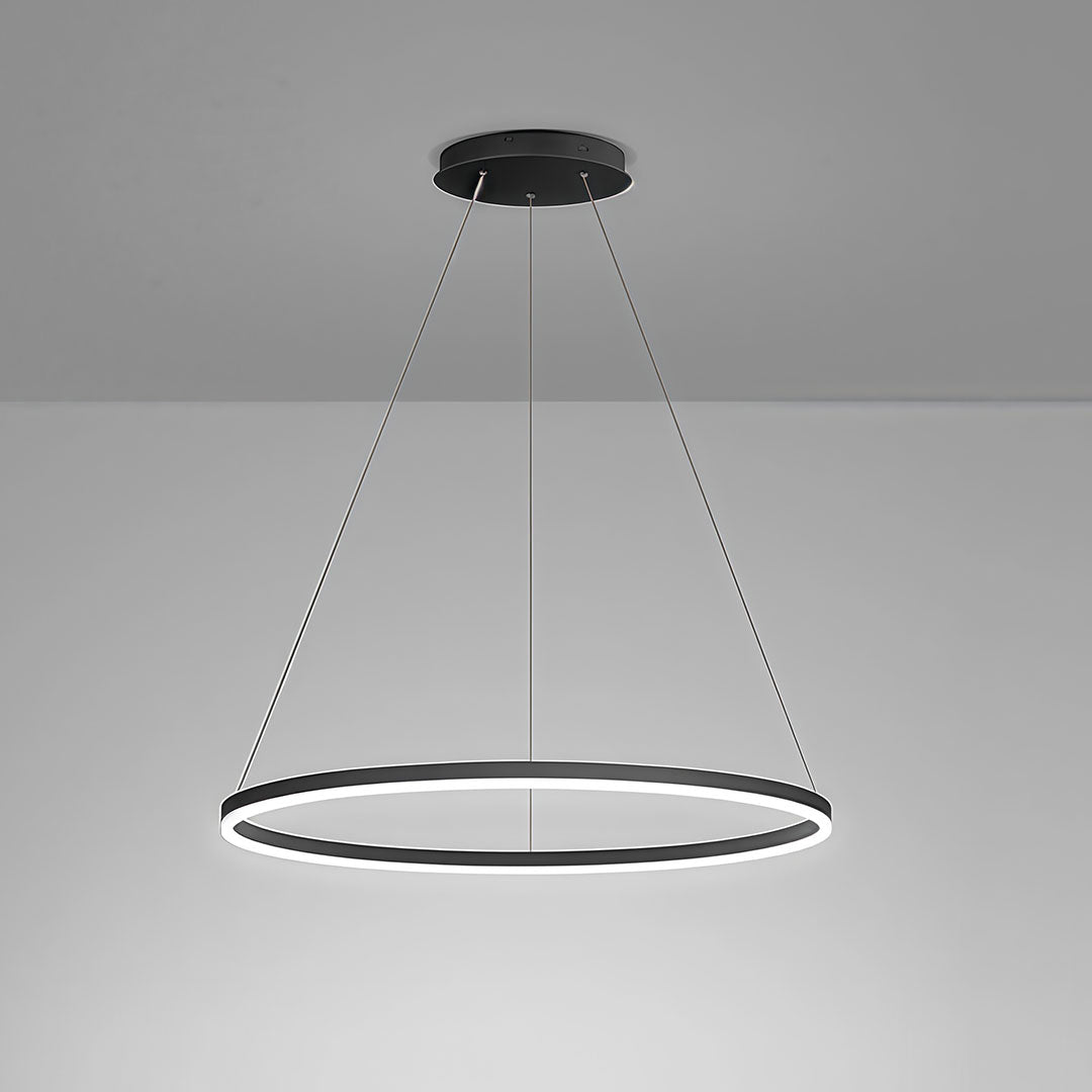 Minimalist black LED ring chandelier fixture with cool white light on a grey studio background.