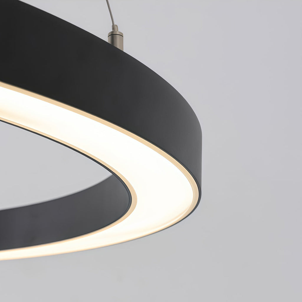 Close-up view of oval chandelier integrated LED lighting edge design.